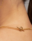 Nicole delicate layered gold necklace by PIERETTI styled with modern look, double chain design
