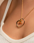 Chantal zirconia heart necklace by PIERETTI, polished gold-plated chain with zirconia pendant detail