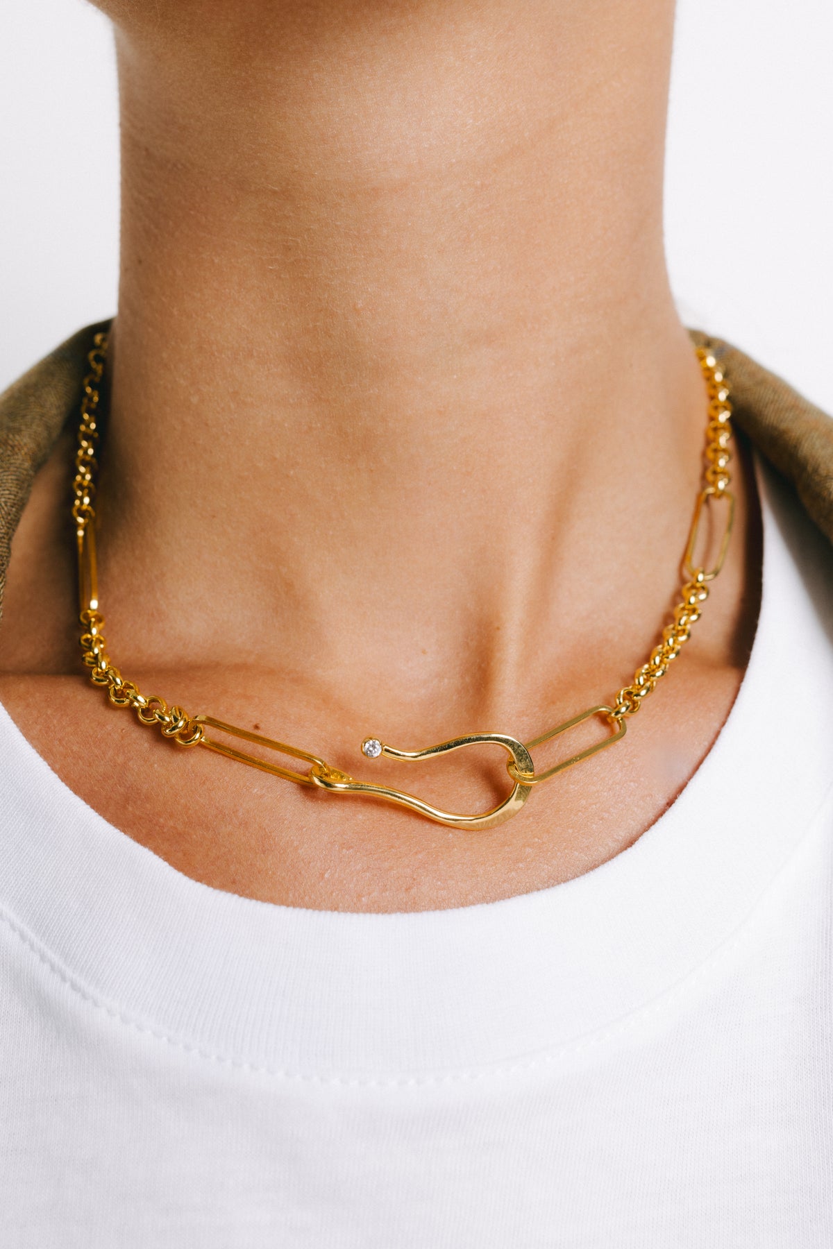 Model wearing Flavia Cubic Zirconia Pendant Necklace in Gold Plate by Pieretti
