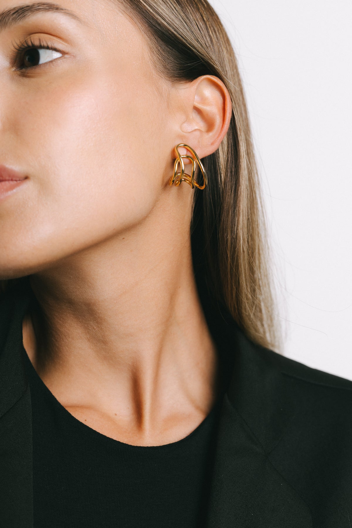 Model wearing Febe Open-Link Earrings in Gold Plate by Pieretti