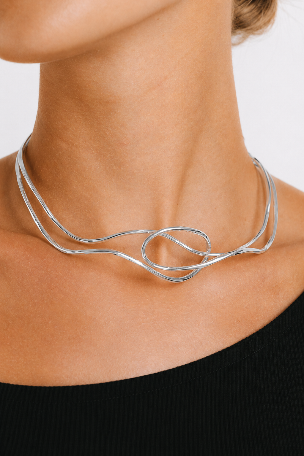 Model wearing Fergie Open Choker F48S in Silver Plate by Pieretti