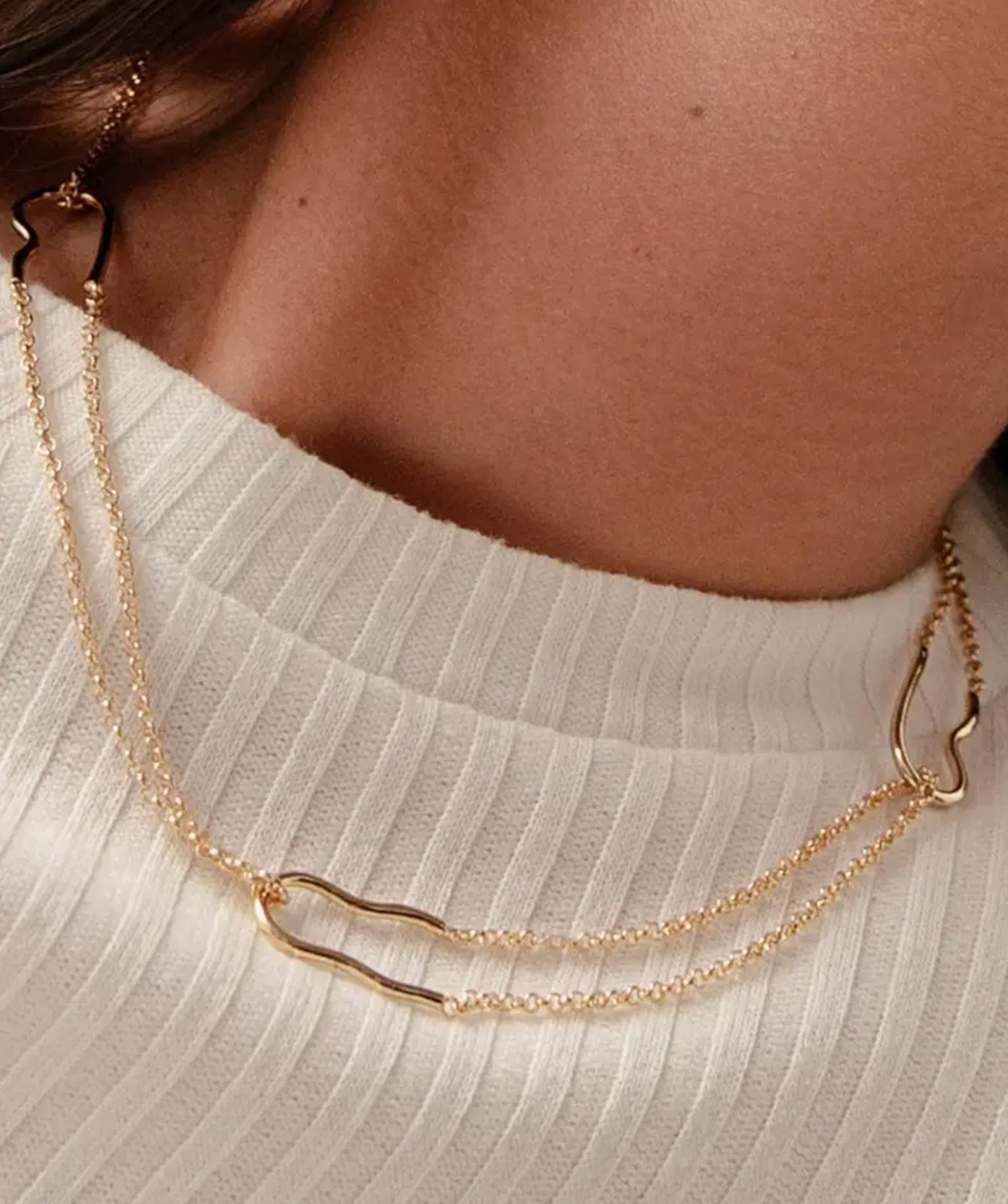 Nicole double chain necklace by PIERETTI, polished gold-plated layered design detail