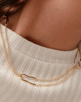 Nicole double chain necklace by PIERETTI, polished gold-plated layered design detail