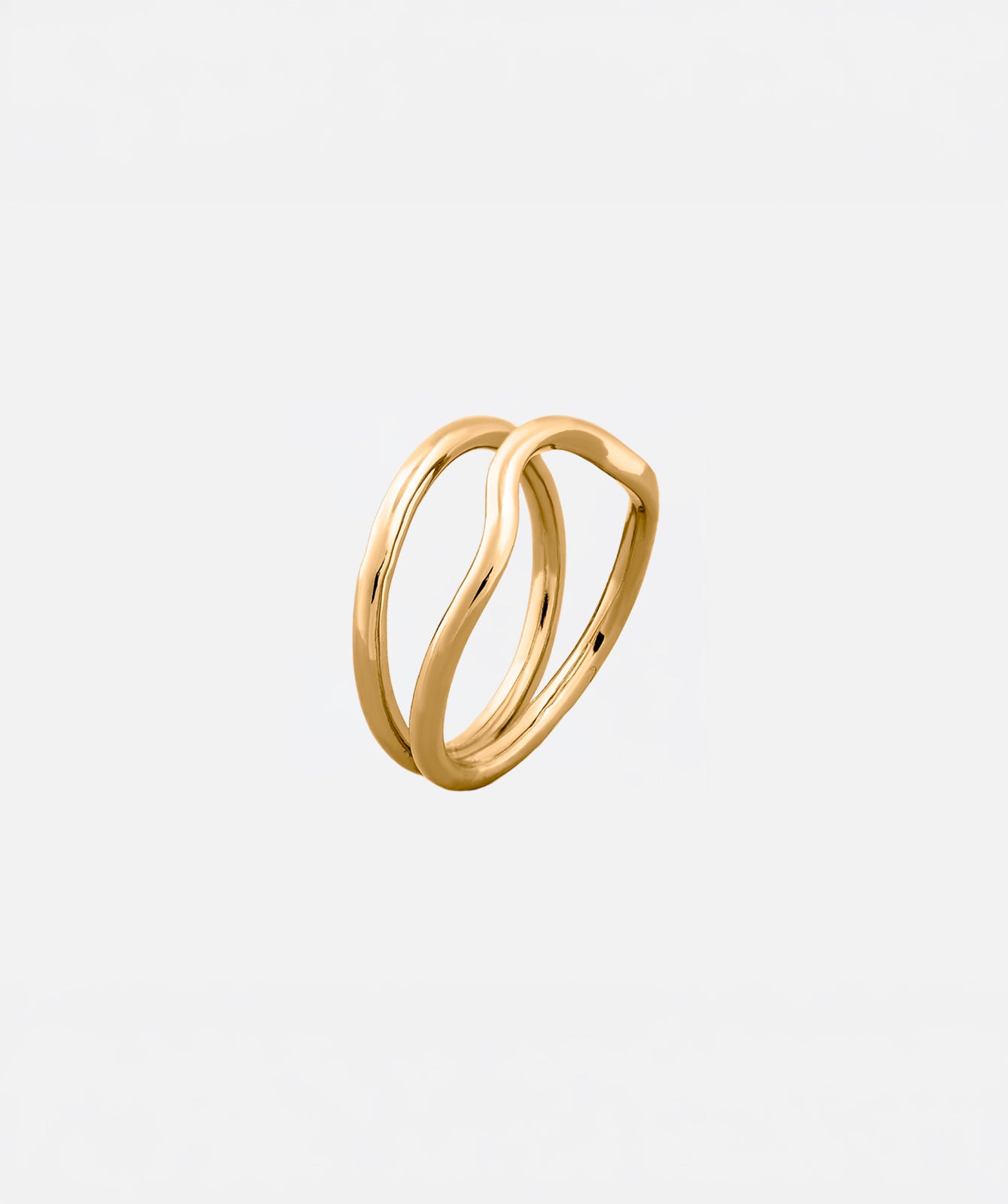 Naeva gold ring by PIERETTI worn on hand, double wave gold ring for stacking and everyday wear