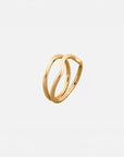 Naeva gold ring by PIERETTI worn on hand, double wave gold ring for stacking and everyday wear
