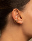 Naeva double ear cuff by PIERETTI, polished 18K gold-plated sculptural design detail