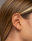 Nora gold ear cuff by PIERETTI, polished gold-plated design detail 