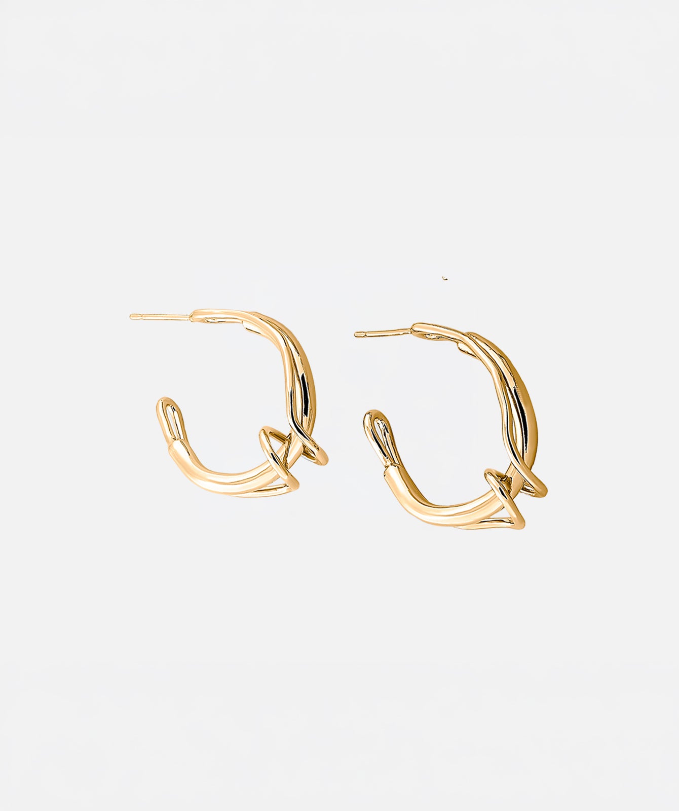 Claudette gold hoop earrings M by PIERETTI in 18K gold plating, handcrafted medium gold hoops available worldwide