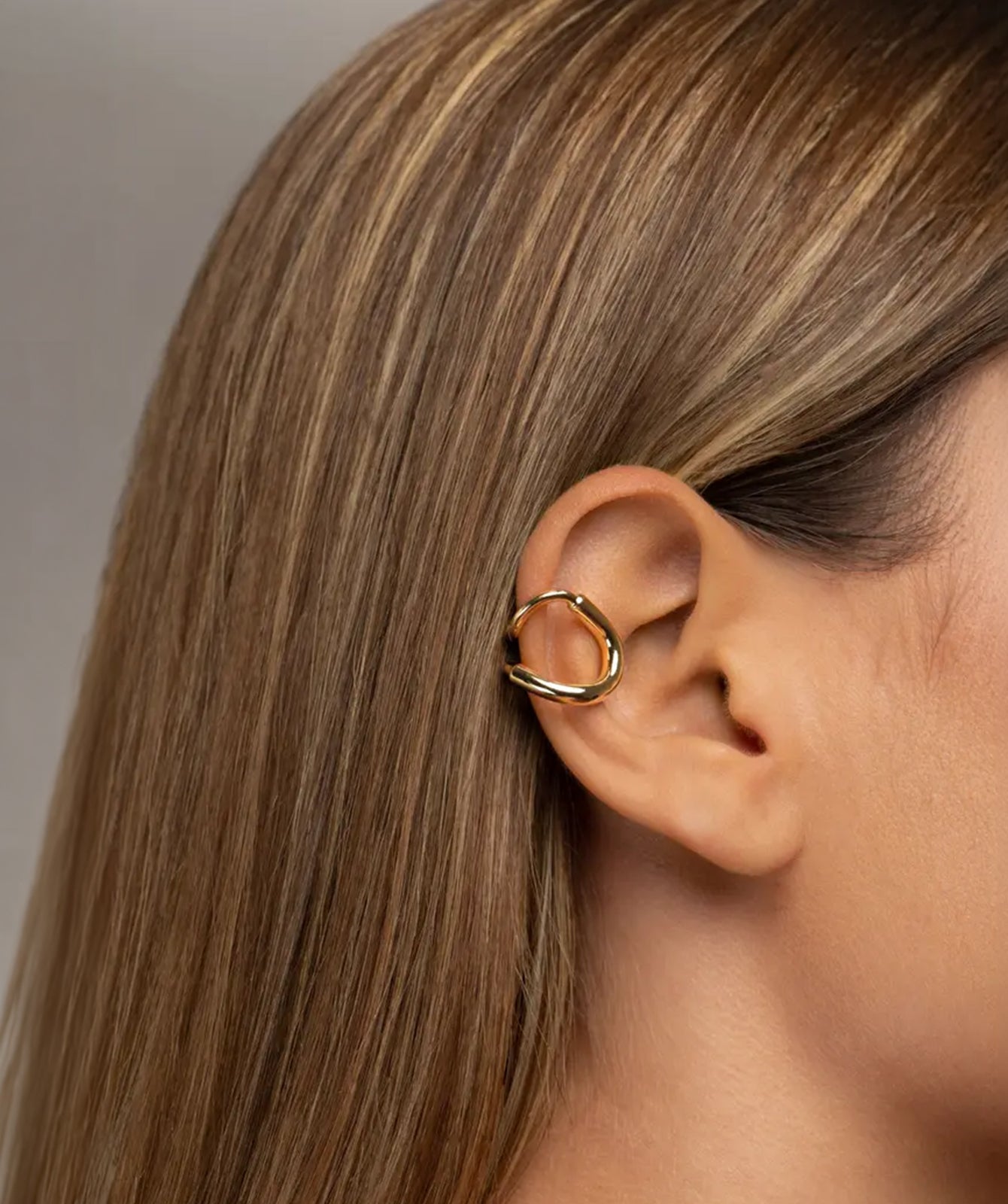 18K gold-plated Cala ear cuff by PIERETTI, lightweight handcrafted ear cuff for stacking and layering