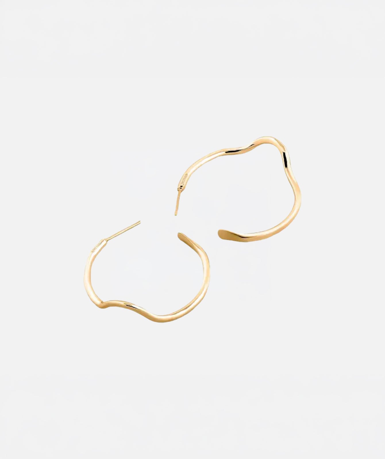 Noele large gold wave hoop earrings by PIERETTI in 18K gold plating, handcrafted statement hoops