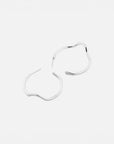 Noele large silver wave hoop earrings by PIERETTI in 925 silver, handcrafted statement hoops