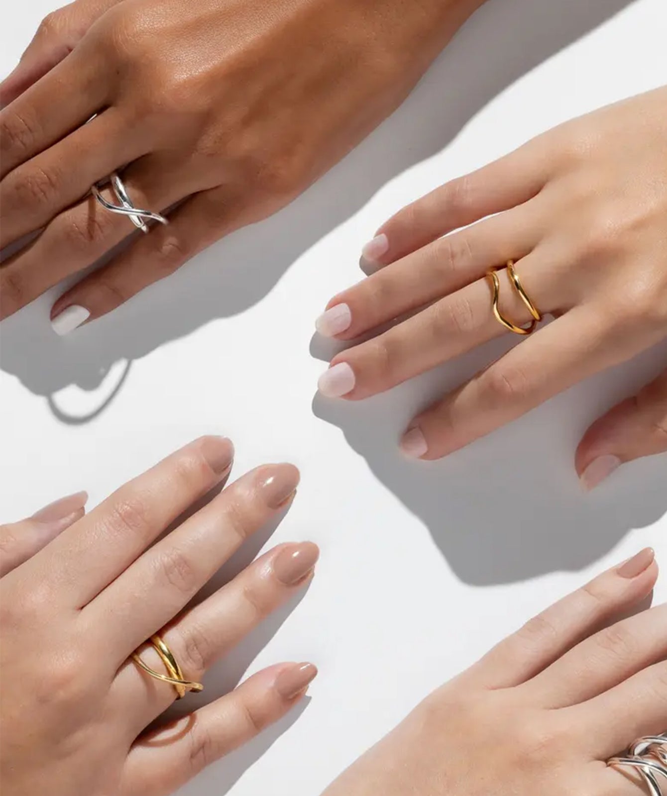 Double wave gold ring by PIERETTI, polished 18K gold-plated sculptural design detail