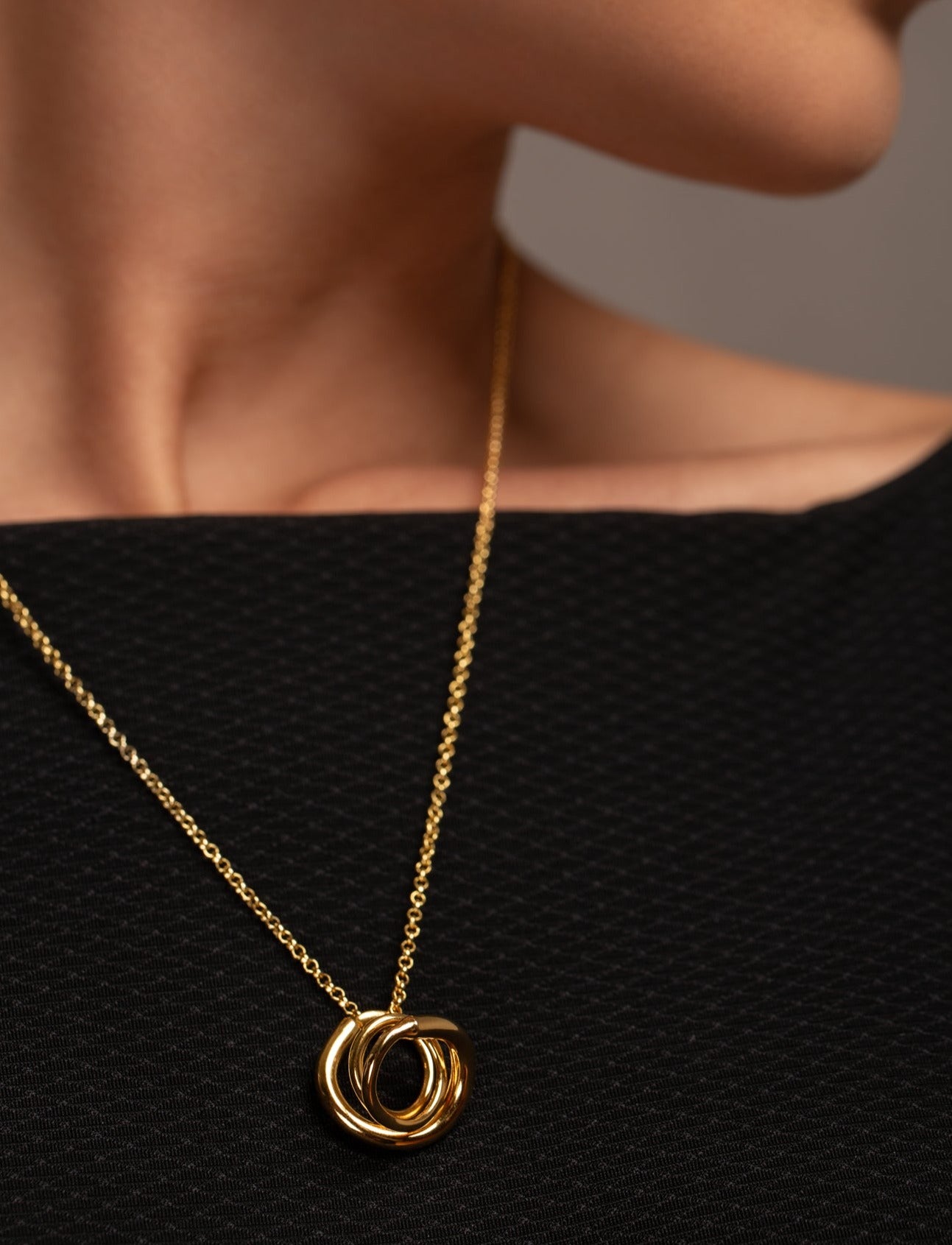 Celine gold pendant